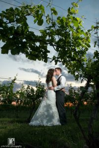 Couple in the vineyard, Wedding Ceremonies and Receptions at Casa Larga Vineyards