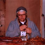 Mr. C, Founder of Casa Larga Vineyards, hand grafting vines in the cellar