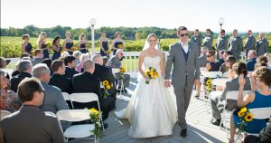 Bride and groom walking down aisle, Patio Ceremony, Wedding Receptions and Ceremonies at Casa Larga Vineyards