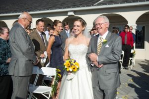 Bride and father walking down aisle, Patio, Wedding Receptions and Ceremonies at Casa Larga Vineyards