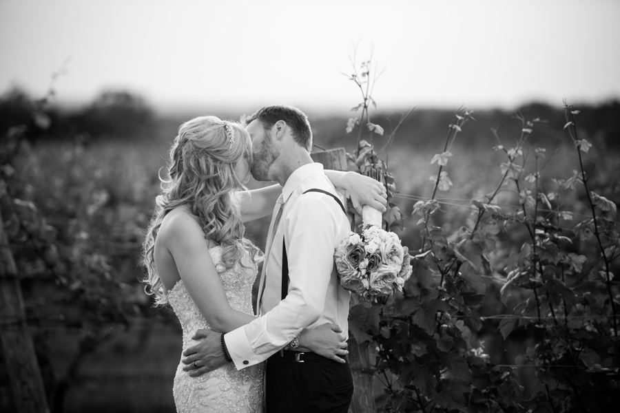 Bride and groom in the vineyard, Weddings and Ceremonies at Casa Larga Vineyards