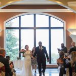 Couple walking down processional, Wedding Ceremonies and Receptions at Casa Larga Vineyards