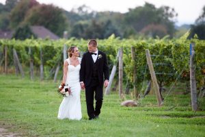 Couple in the Vineyards, Wedding Ceremonies and Receptions at Casa Larga Vineyards