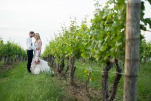 Couple in the Vineyards, Wedding Ceremonies and Receptions at Casa Larga Vineyards