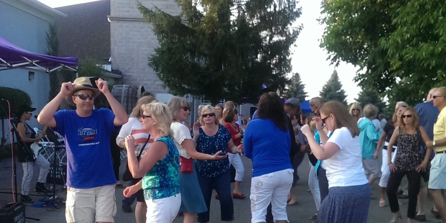 Customers dancing, Patio Parties at Casa Larga Vineyards